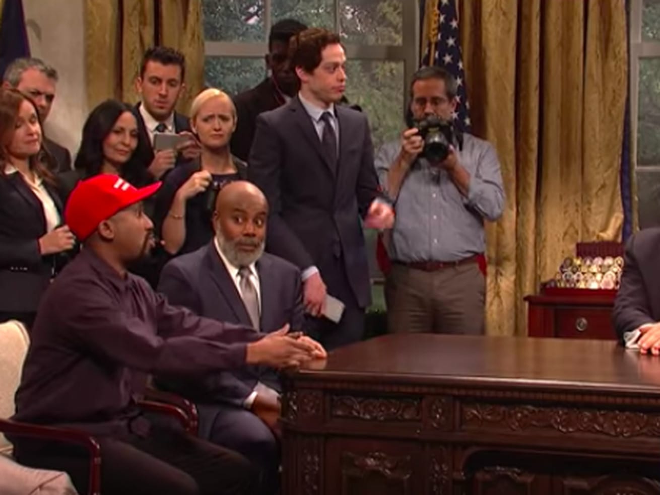 “He’s black me!”: Alec Baldwin returns to SNL to spoof Trump’s Kanye West meeting
