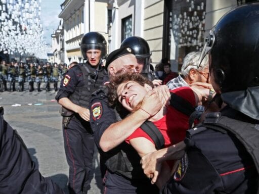 Russian police crack down on protesters during the largest demonstrations in a decade
