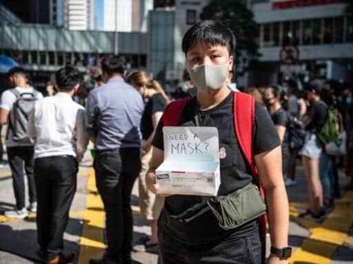The Hong Kong government tried to ban face masks. Protesters are already defying it.