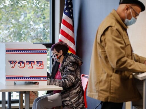 Is it safe to vote in person? Experts say yes — with a few conditions.