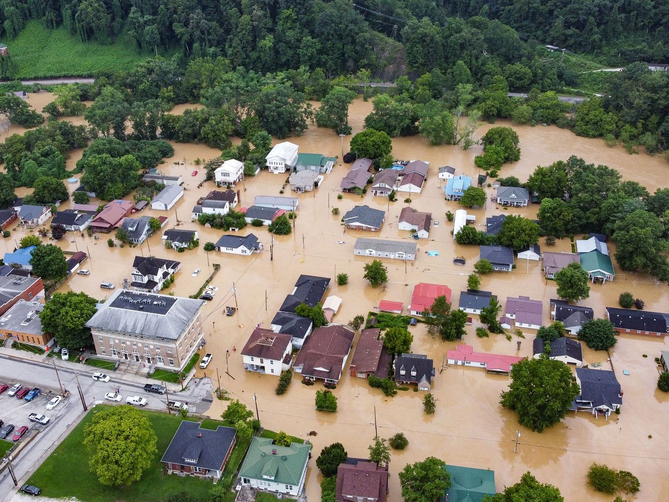 How are floods and droughts happening at the same time?